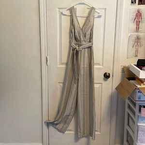 Tan and striped jumpsuit with V-neck back and front
